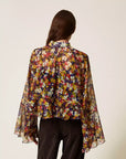 Blusa twisnet
