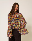 Blusa twisnet